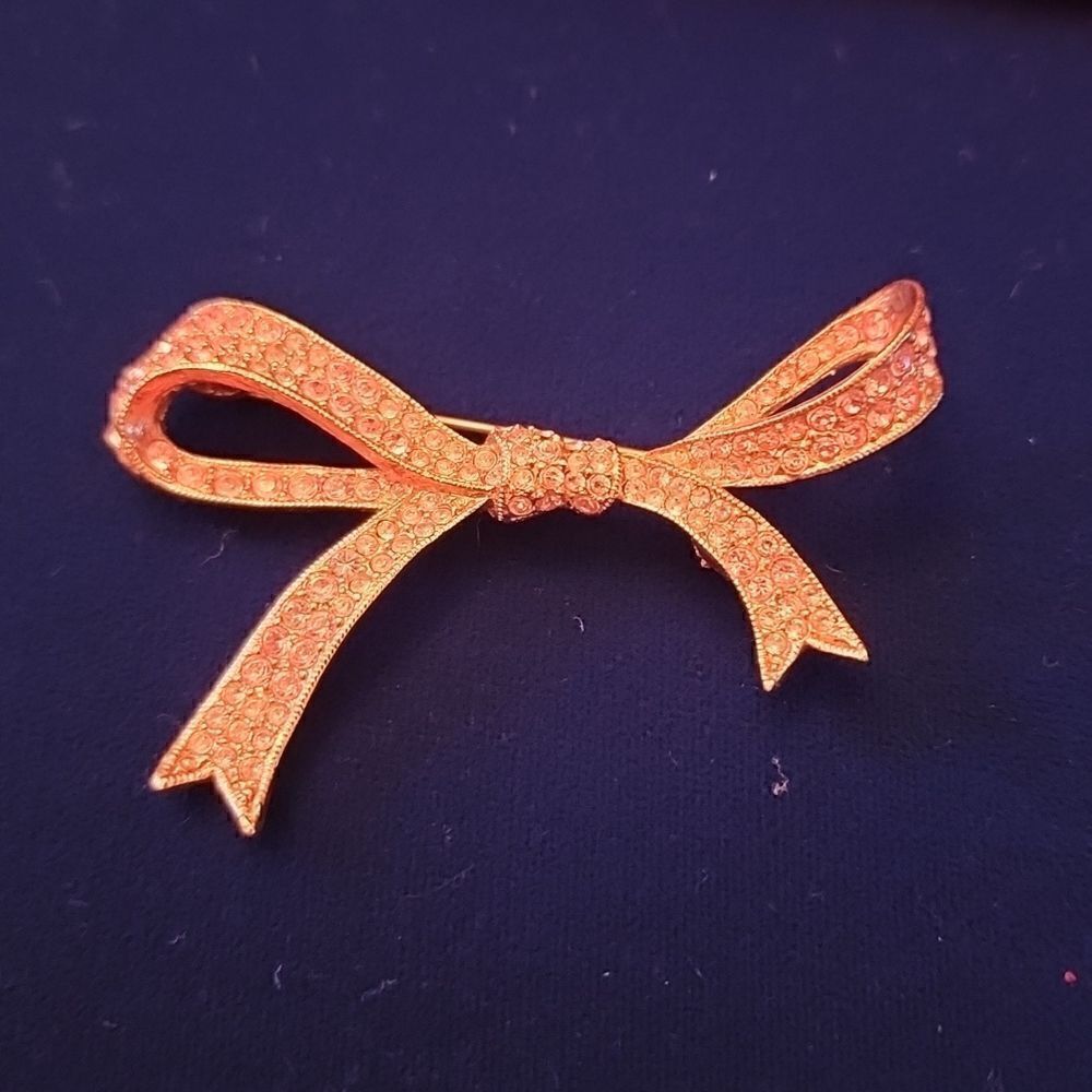 Kenneth Jay Lane Pink Rhinestone and Rose Gold Tone Ribbon Bow Brooch Pin